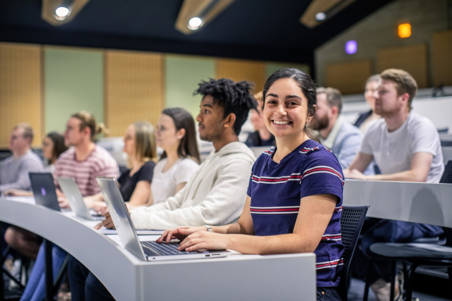 Students on campus in lecture hall